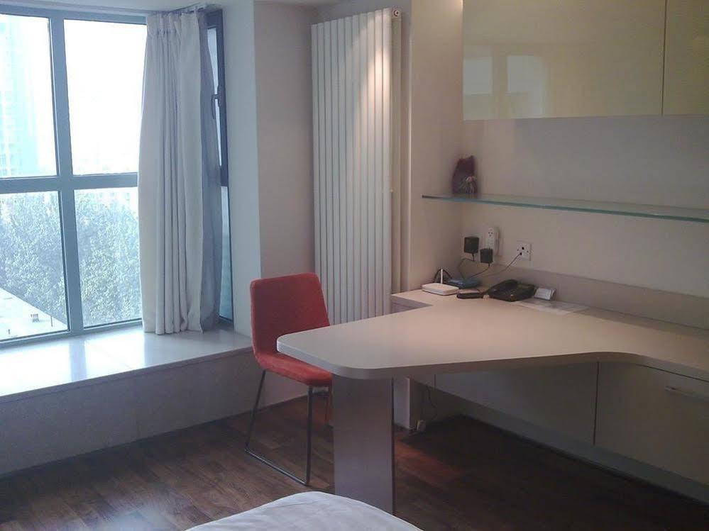 Seasons Park Apart Hotel Beijing Bagian luar foto