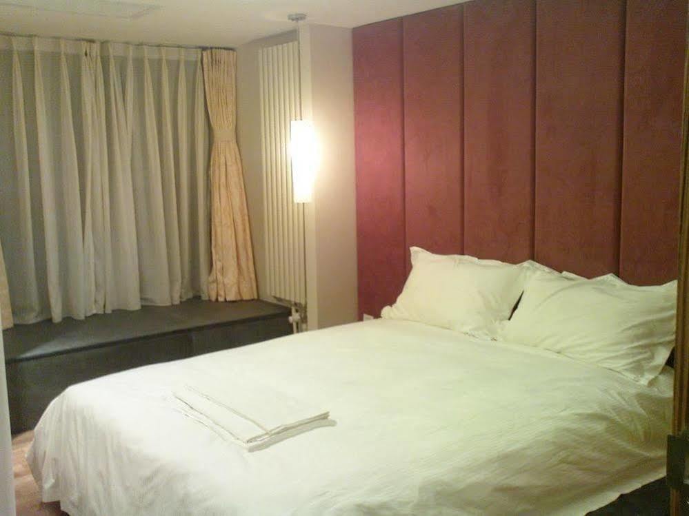 Seasons Park Apart Hotel Beijing Bagian luar foto